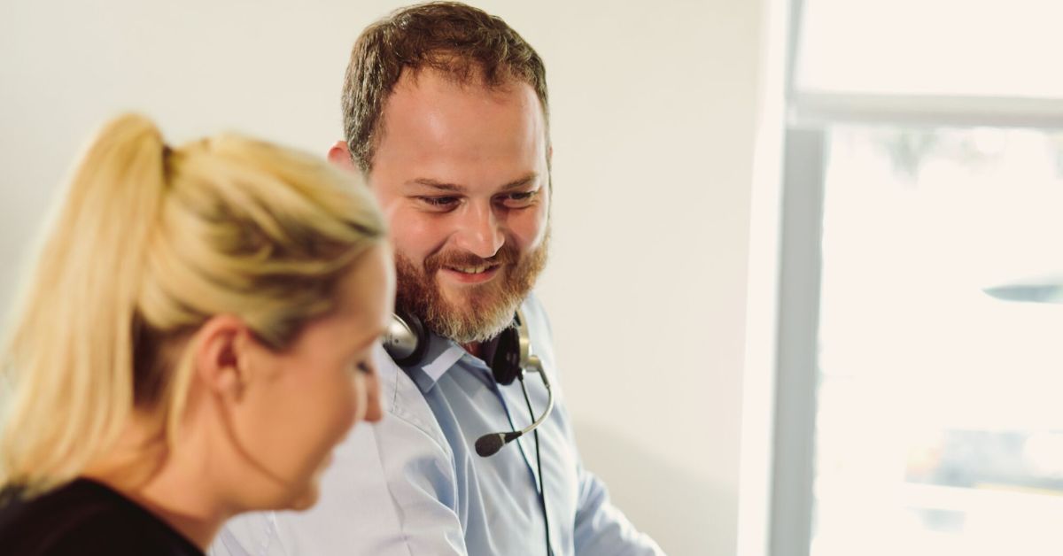 A man and a woman in a call centre