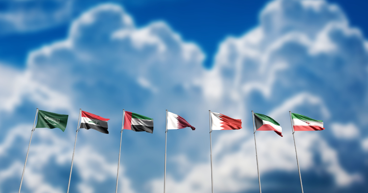 A closeup of several Middle Eastern flags
