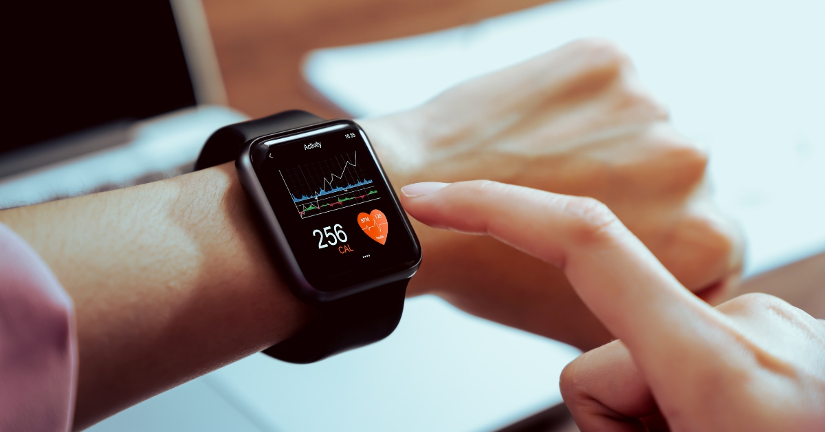 Woman looking at a smartwatch on her wrist