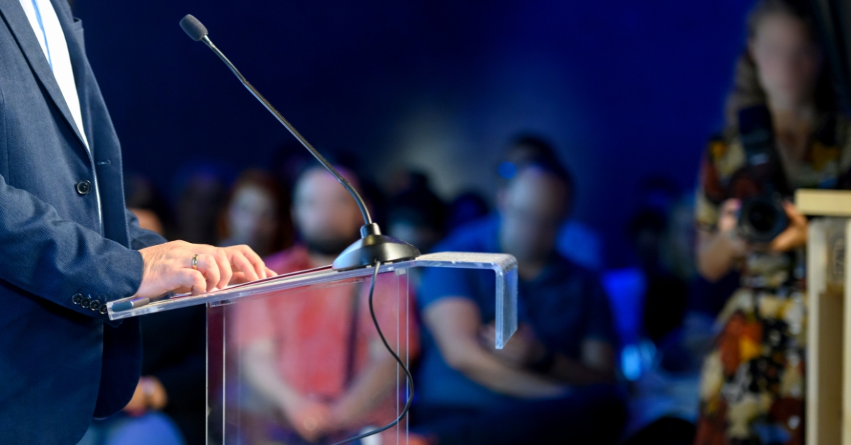 A closeup of a person public speaking