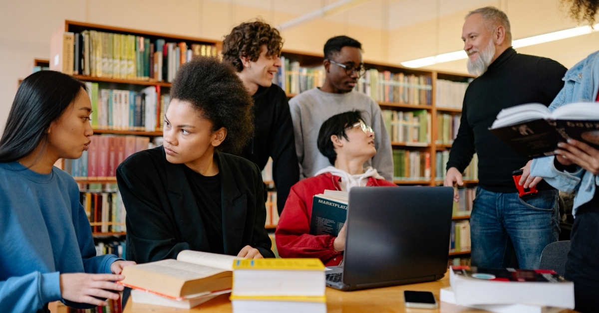 A group of people in a library